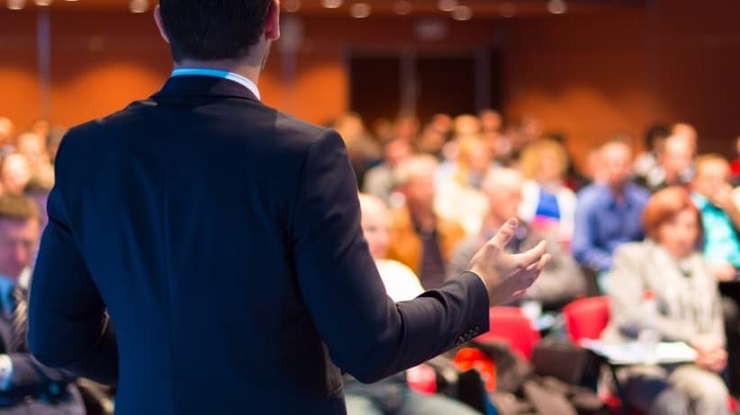 man delivering a speech