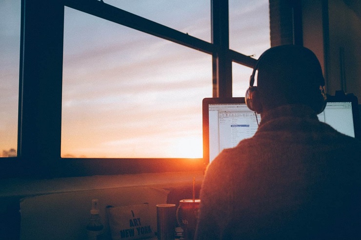 lonely guy in front of computer building saas products