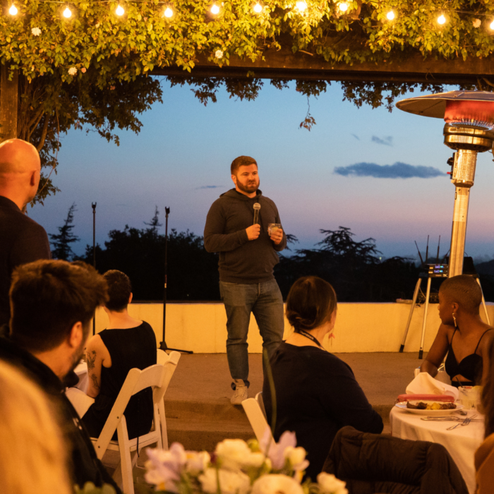 Marco Zappacosta speaking at event