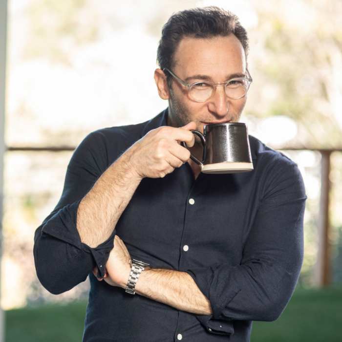 Simon sinek sipping coffee